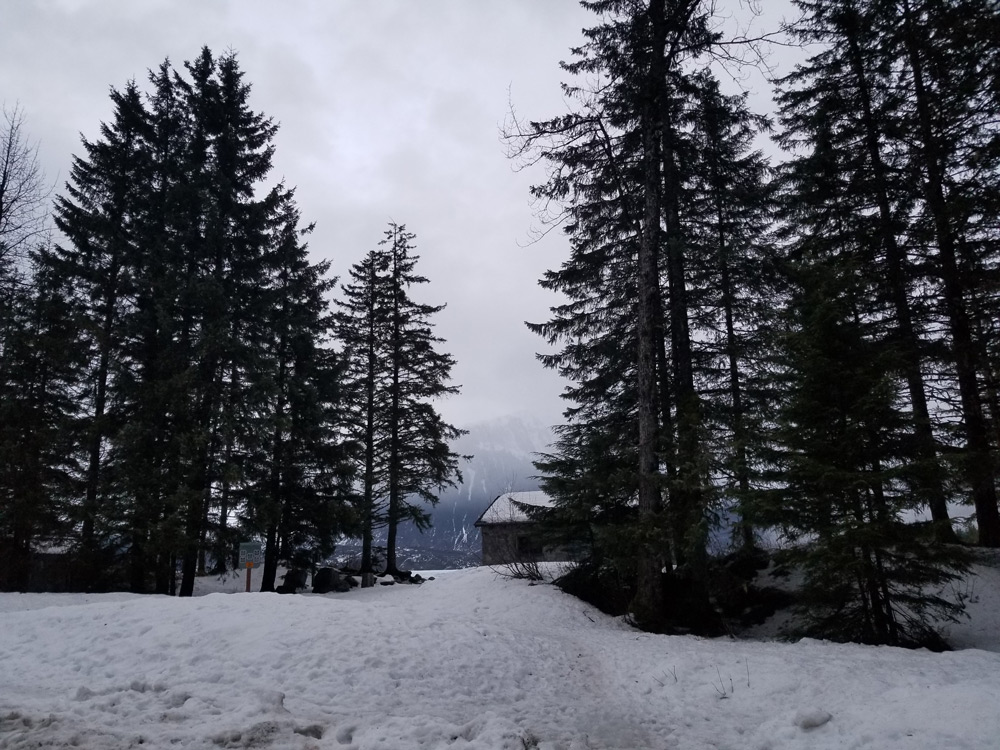 Scenic landscape shot of Skater's Cabin in the snow near Mendenhall Glacier